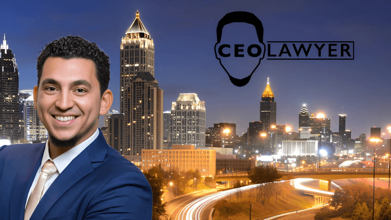 Smiling man in a blue suit stands in front of Atlanta skyline with "CEO Lawyer" logo in background.