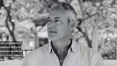Black and white portrait of a man in a relaxed outdoor setting. He gazes thoughtfully to the side, with trees in the blurred background. Text overlay discusses the unconscious mind with a serene tone.