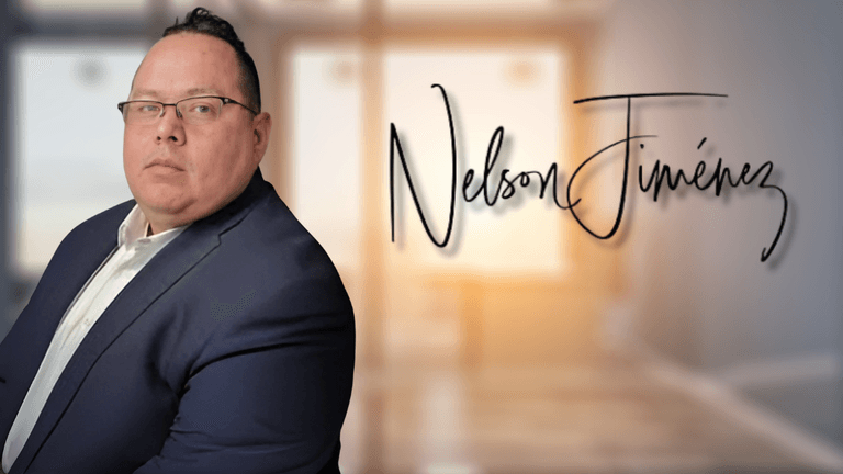 Nelson Jimenez, General Sales Manager at Vineland Hyundai, exudes professionalism and confidence in a business attire portrait.