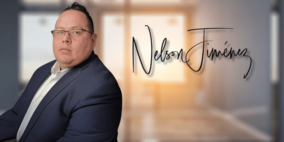 Nelson Jimenez, General Sales Manager at Vineland Hyundai, exudes professionalism and confidence in a business attire portrait.