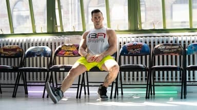 "Anthony Espo leading free fitness classes in the park, building community and strength."
