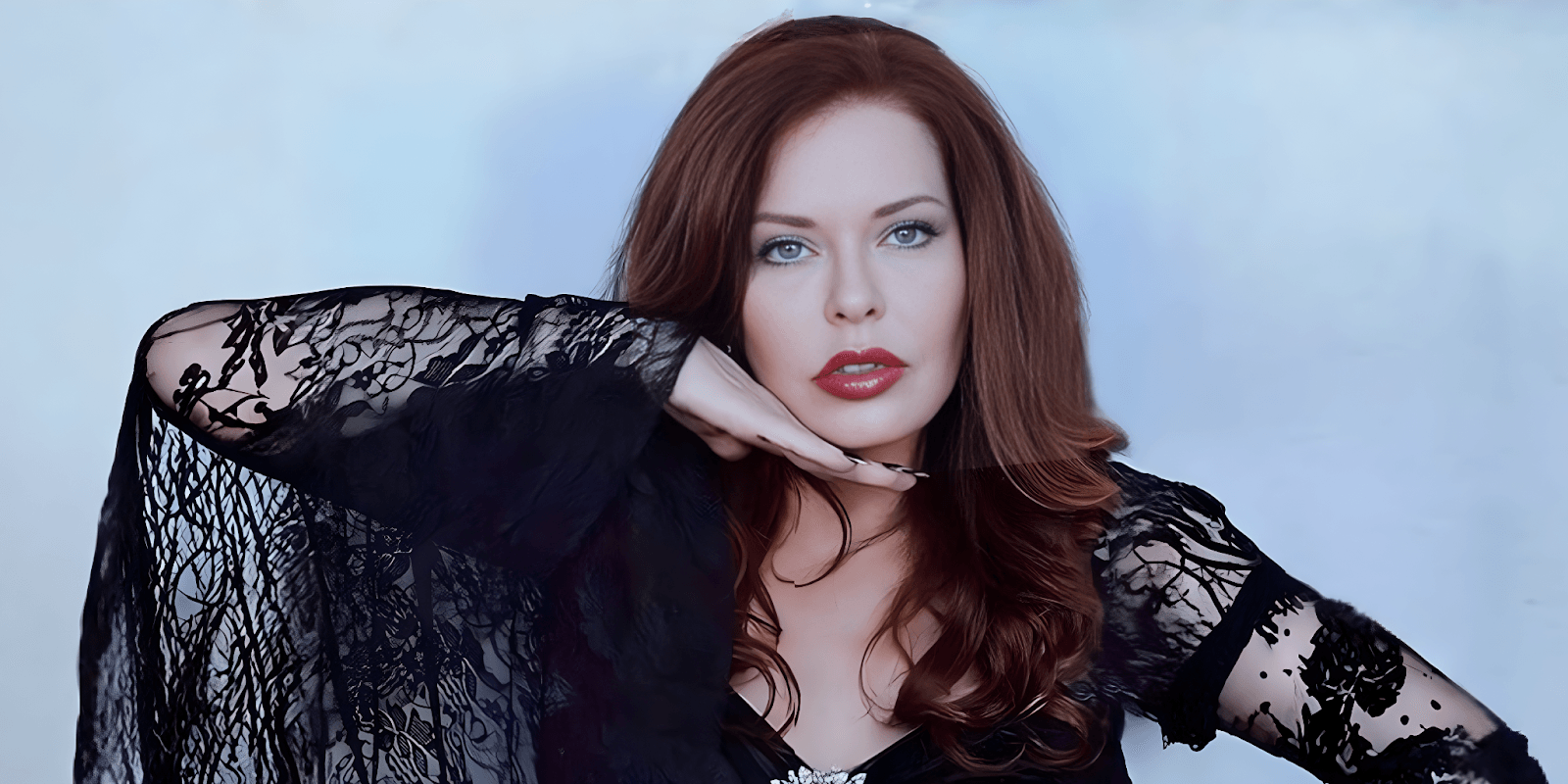 Actress Laura Meadows exudes confidence and allure in her role as the sinister Grandma in the supernatural thriller "The Salem Chronicles."