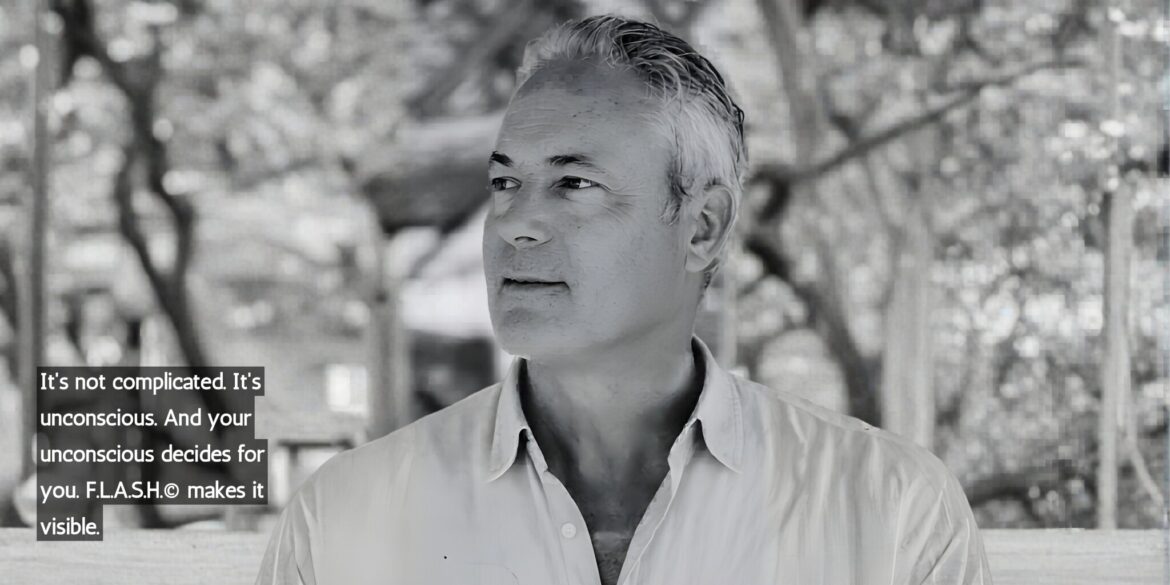 Black and white portrait of a man in a relaxed outdoor setting. He gazes thoughtfully to the side, with trees in the blurred background. Text overlay discusses the unconscious mind with a serene tone.